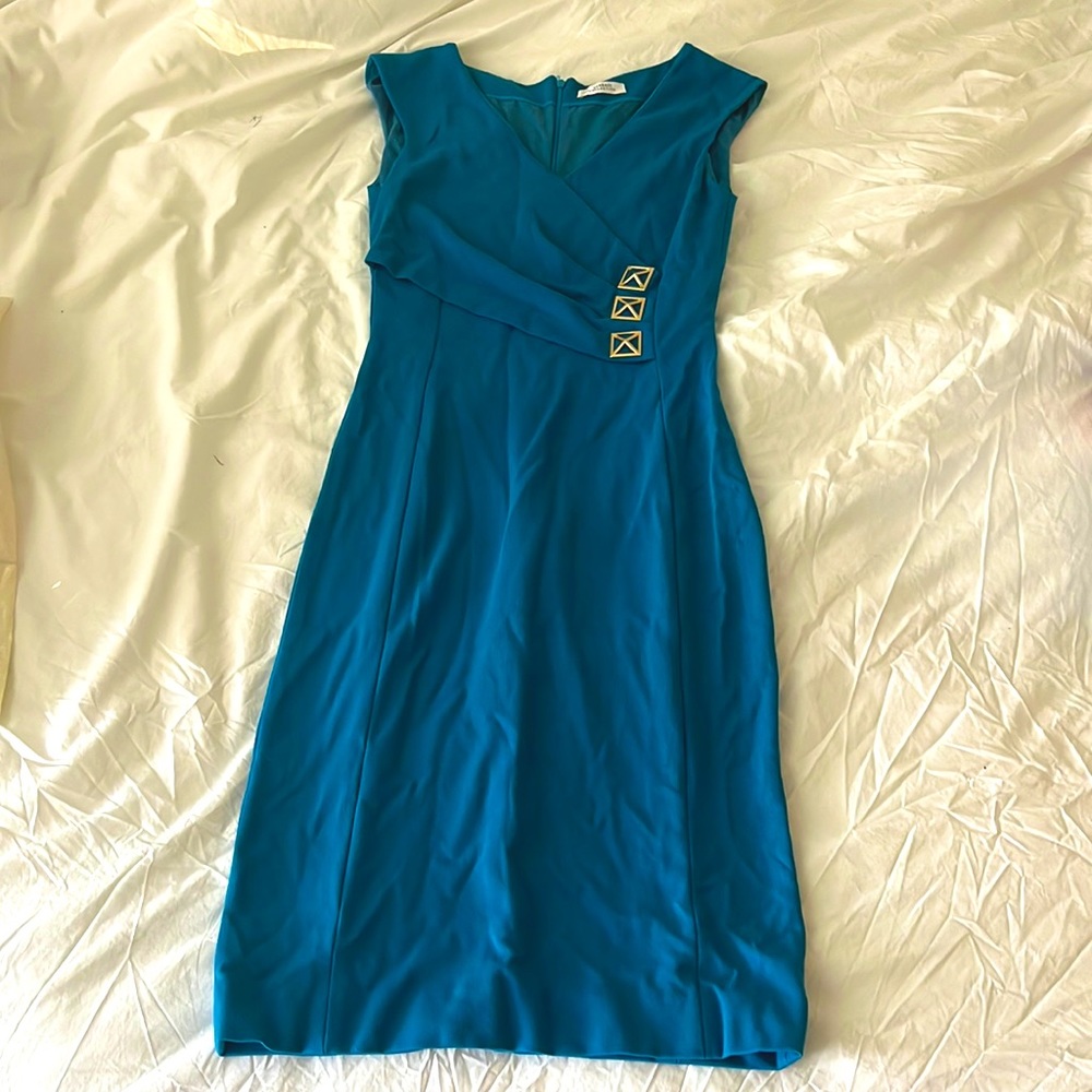 A gorgeous stretchy Versace Collection body-hugging dress with metal detailing